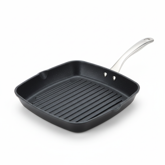 Square non-stick grill pan with raised ridges on white studio background
