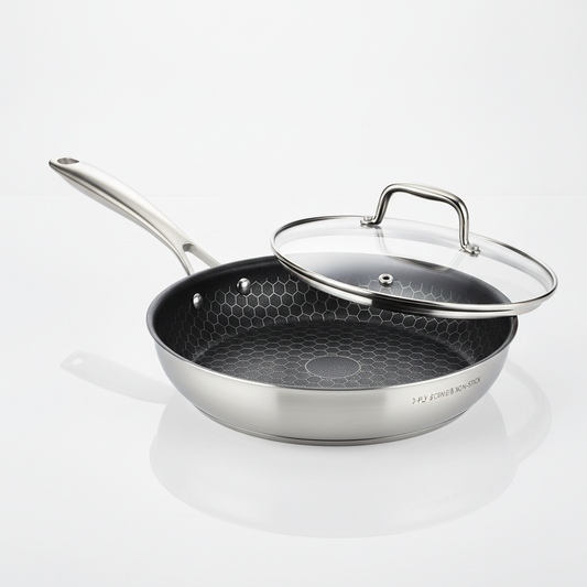 Premium 3-ply stainless steel fry pan with honeycomb non-stick interior and tempered glass lid on white background